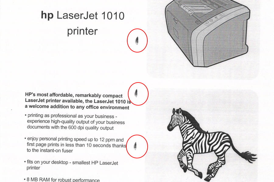 Принтер Sharp оставляет точки при печати