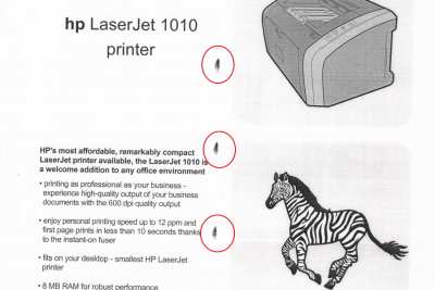 Принтер Panasonic оставляет точки при печати